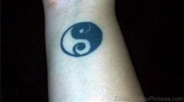 Small Yin Yang Tattoo On Wrist 