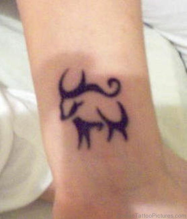 Taurus symbol wrist tattoo