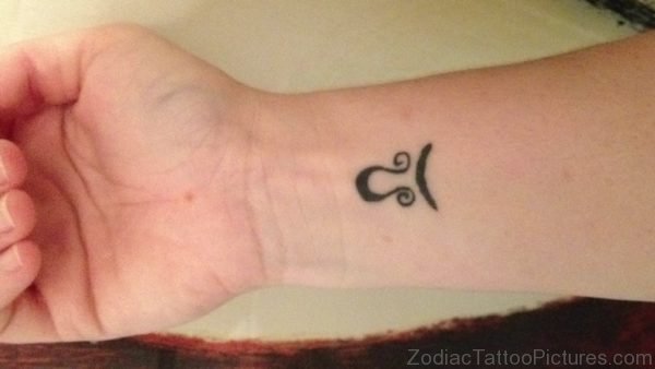 Tiny Libra Tattoo 