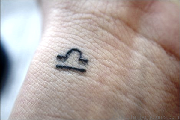 Tiny Libra Wrist Tattoo 