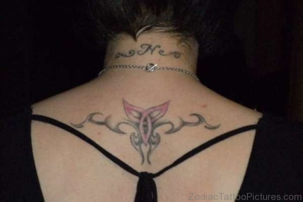 Tribal Aries Tattoo On Upper Back