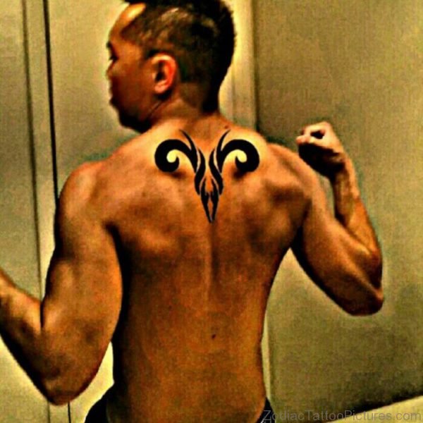 Tribal Aries Tattoo On Upper Back