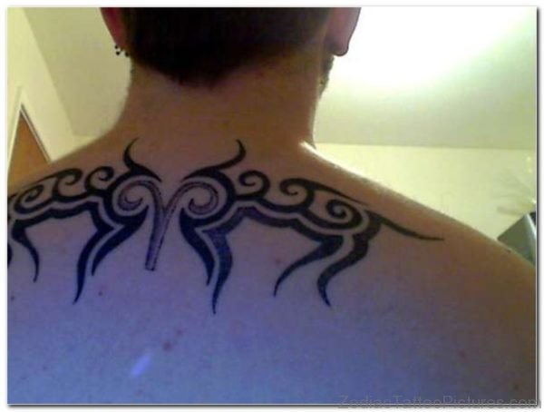 Tribal Aries Tattoo On Upper Back For Women