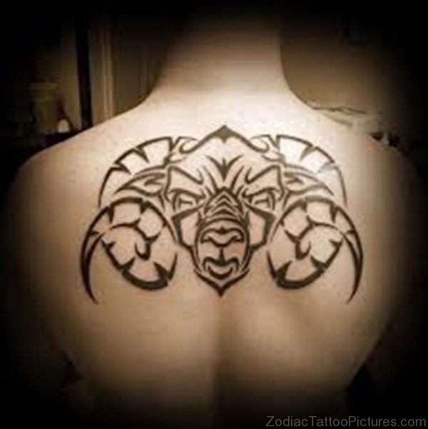 Tribal arise tattoos on upper back
