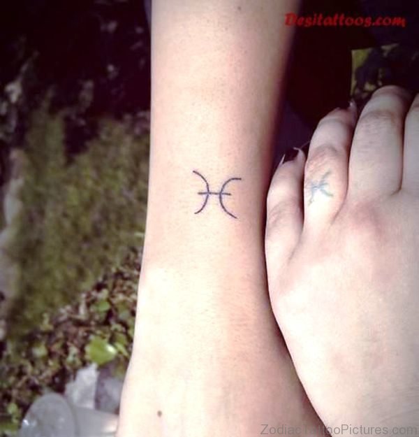 Wonderful Pisces Tattoo On Wrist 