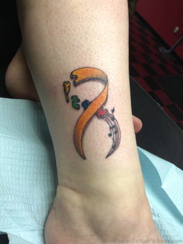 Yellow Ribbon Autism Music Tattoo On Wrist